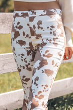 Load image into Gallery viewer, Cow Print Flare Jeans
